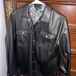 Long sleeve leather jacket with a long sleeve tight snake print shirt
